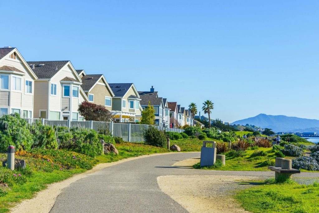 A row of modern coastal homes near Santa Barbara, illustrating the type of residential neighborhoods served by All American Generator Services for backup generator for home and business installations.